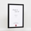 Efektný drevený rám profil 33 čierny 23x70 cm antireflexné sklo